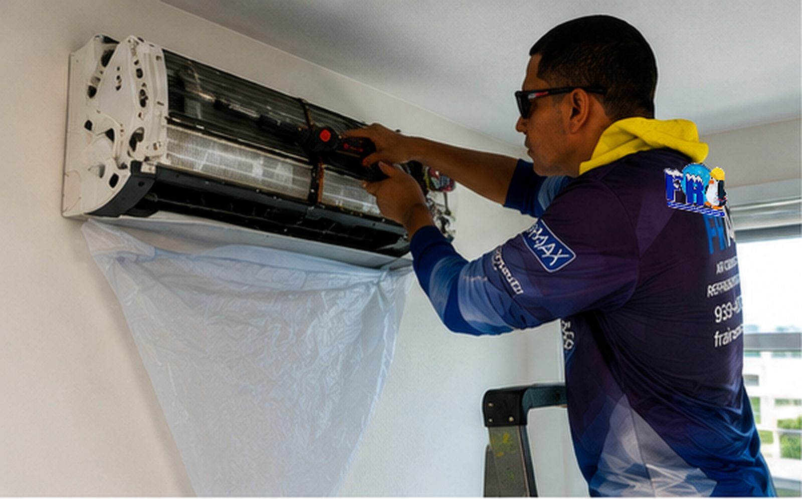 Illustration: FR Air technician working on a wall-mounted mini-split